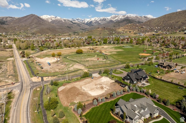 aerial view with a mountain view and a residential view