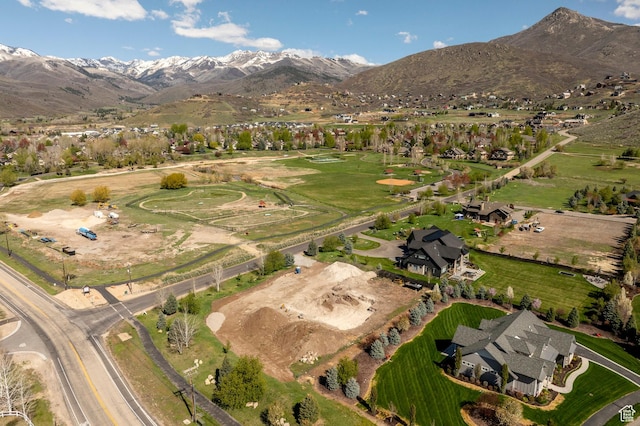 drone / aerial view featuring a mountain view