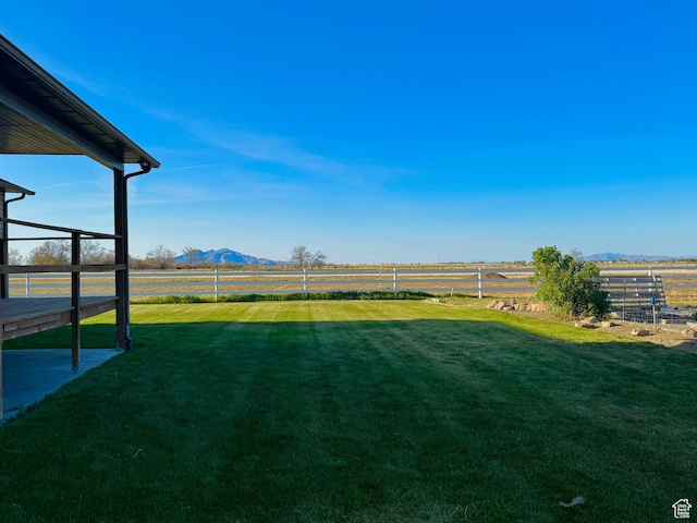 848 N Cooley St W, Grantsville, UT 84029 - view of yard with a mountain view, fence, and a rural view
