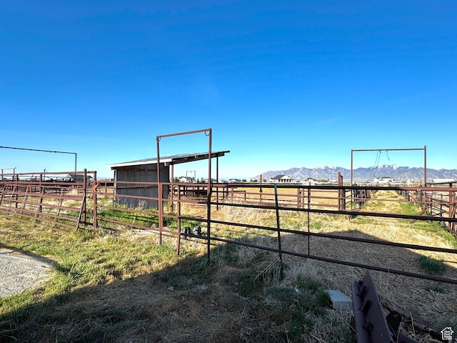 848 N Cooley St W, Grantsville, UT 84029 - view of yard with an outbuilding, an exterior structure, a rural view, and a mountain view