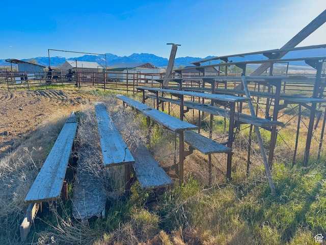 848 N Cooley St W, Grantsville, UT 84029 - exterior space featuring an outdoor structure, an exterior structure, a mountain view, and a rural view