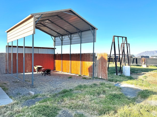 848 N Cooley St W, Grantsville, UT 84029 - view of outbuilding with fence and a carport