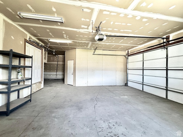 848 N Cooley St W, Grantsville, UT 84029 - garage featuring a garage door opener