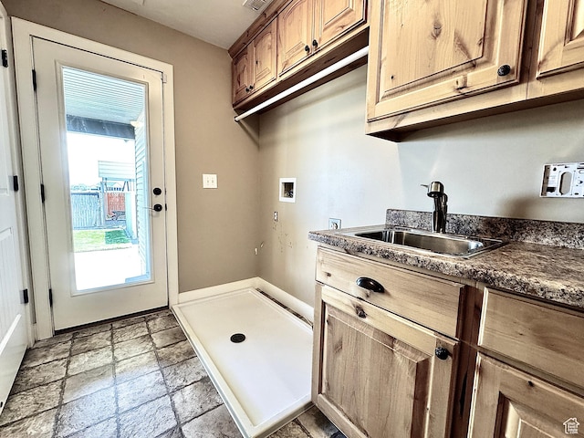 848 N Cooley St W, Grantsville, UT 84029 - laundry area with cabinet space, stone tile floors, a sink, and hookup for a washing machine