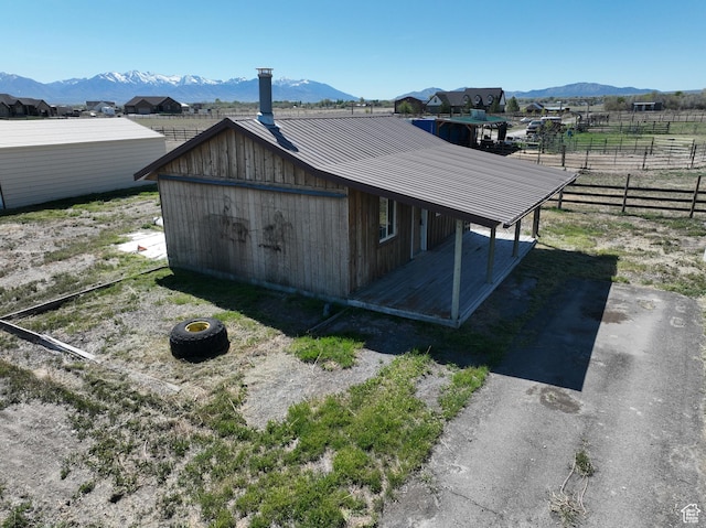 848 N Cooley St W, Grantsville, UT 84029 - view of outbuilding with a mountain view and fence