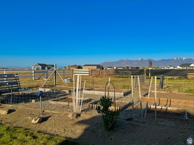 848 N Cooley St W, Grantsville, UT 84029 - view of yard with fence, a mountain view, a garden, and a rural view