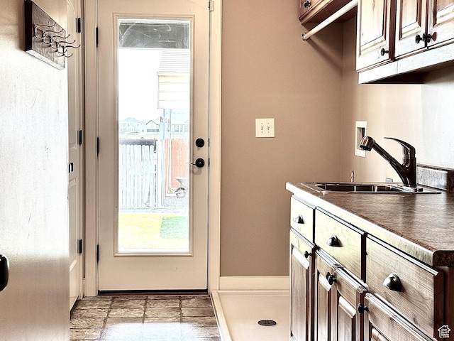 848 N Cooley St W, Grantsville, UT 84029 - washroom with a sink, plenty of natural light, hookup for a washing machine, and cabinet space