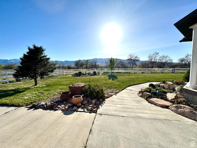 848 N Cooley St W, Grantsville, UT 84029 - view of patio with a rural view, a mountain view, and a fenced backyard
