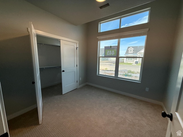 20 N 3830 W Unit 445, West Point, UT 84015 - unfurnished bedroom with carpet flooring, baseboards, and a closet