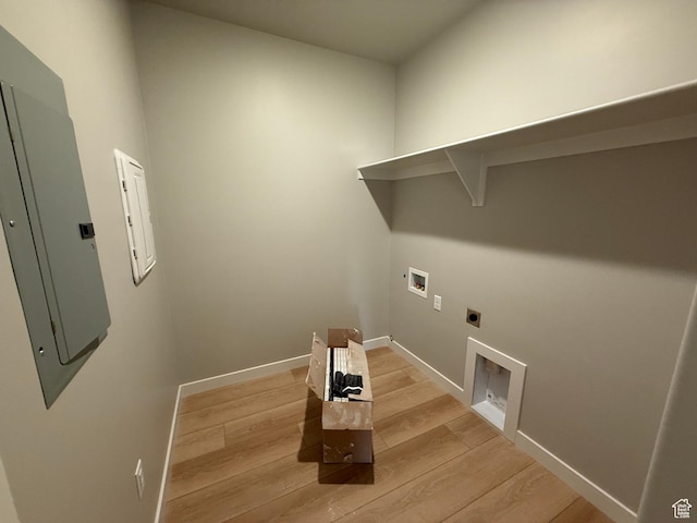 20 N 3830 W Unit 445, West Point, UT 84015 - laundry area with hookup for an electric dryer, hookup for a washing machine, light wood finished floors, electric panel, and baseboards