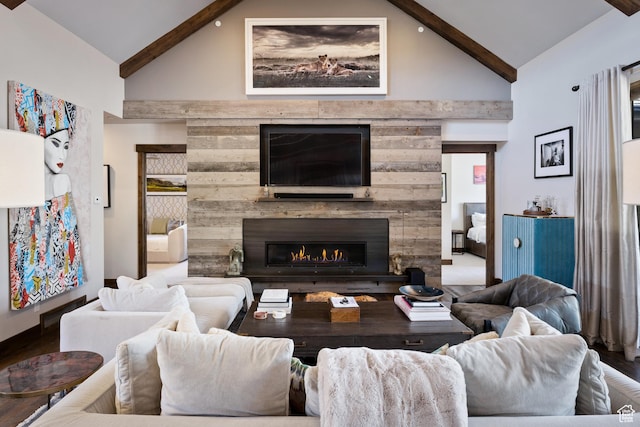 181 N Club Cabins Ct, Heber City, UT 84032 - living room with wood finished floors, a warm lit fireplace, high vaulted ceiling, and beamed ceiling