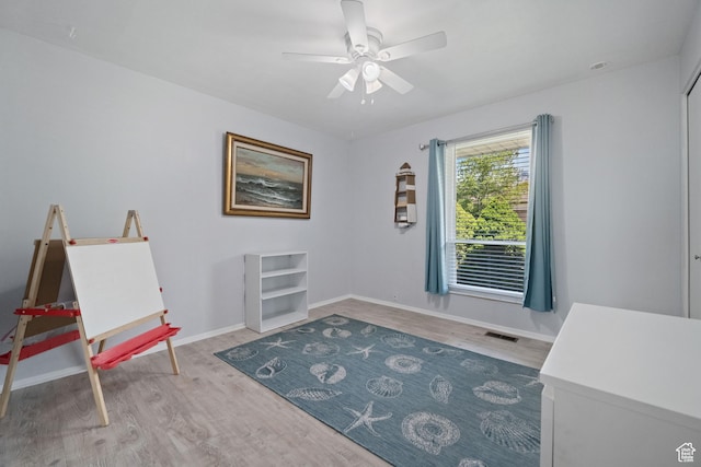 9968 S Blossom Dr, Sandy, UT 84092 - sitting room with ceiling fan, wood finished floors, and baseboards