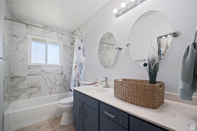 9968 S Blossom Dr, Sandy, UT 84092 - bathroom with toilet, shower / bath combo, vanity, and wood finished floors