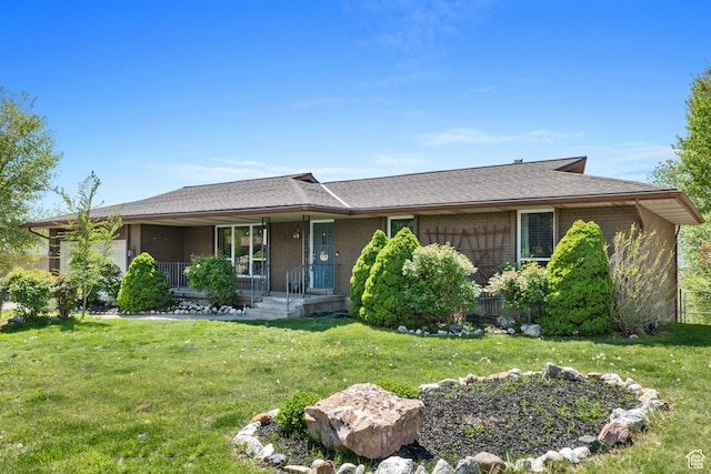 9968 S Blossom Dr, Sandy, UT 84092 - ranch-style home featuring a porch, a front yard, and brick siding