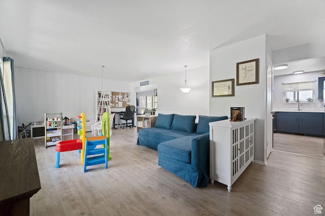 9968 S Blossom Dr, Sandy, UT 84092 - living area with light wood-style floors