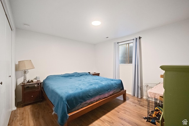 9968 S Blossom Dr, Sandy, UT 84092 - bedroom featuring wood finished floors and baseboards