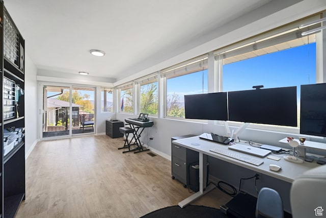 9968 S Blossom Dr, Sandy, UT 84092 - office space featuring baseboards and light wood-style flooring