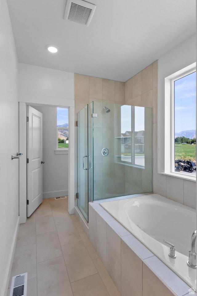 167 N 950 E Unit 33, Tremonton, UT 84337 - full bath featuring visible vents, a stall shower, and a wealth of natural light