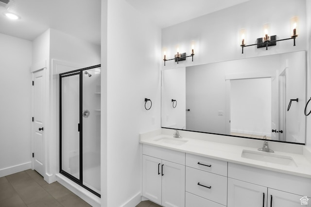 167 N 950 E Unit 33, Tremonton, UT 84337 - bathroom with double vanity, a sink, baseboards, and a shower stall