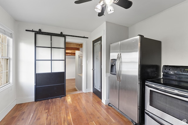 605 E 700 N, Pleasant Grove, UT 84062 - kitchen with baseboards, ceiling fan, appliances with stainless steel finishes, and wood finished floors
