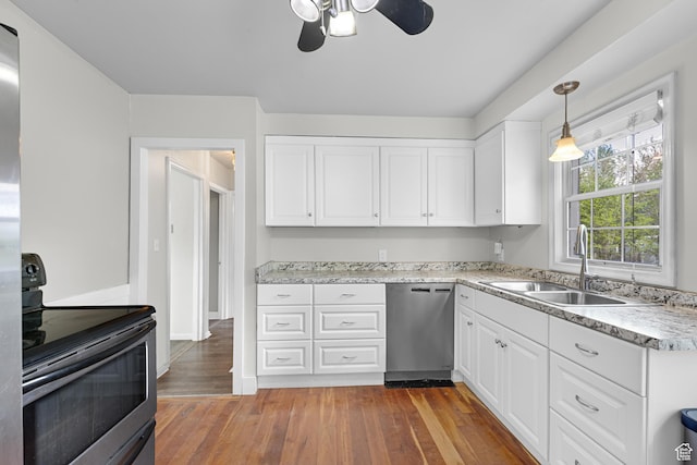605 E 700 N, Pleasant Grove, UT 84062 - kitchen with a ceiling fan, appliances with stainless steel finishes, a sink, wood-type flooring, and white cabinetry