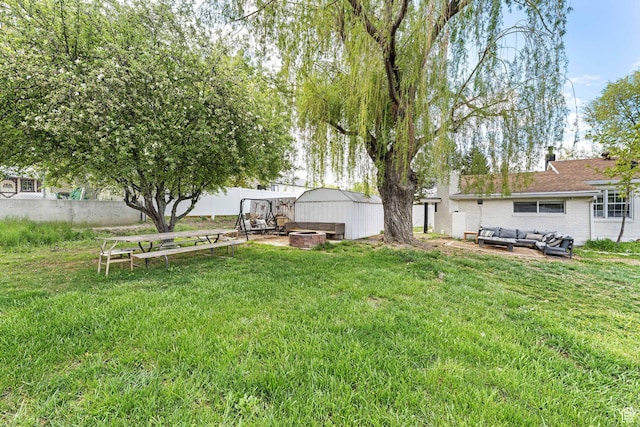 605 E 700 N, Pleasant Grove, UT 84062 - view of yard with a fire pit, an outdoor structure, and a storage unit