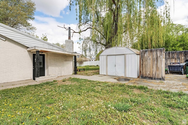 605 E 700 N, Pleasant Grove, UT 84062 - view of yard with a storage shed, fence, and an outbuilding