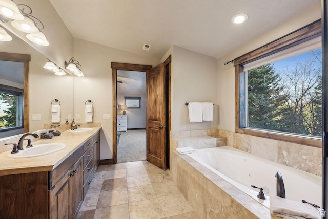 210 Parkview Dr, Summit Park, UT 84098 - full bathroom featuring a sink, a jetted tub, vaulted ceiling, and double vanity