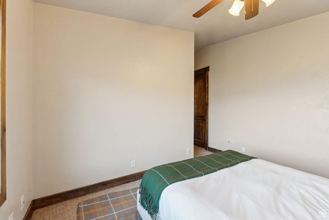 210 Parkview Dr, Summit Park, UT 84098 - carpeted bedroom with a ceiling fan and baseboards