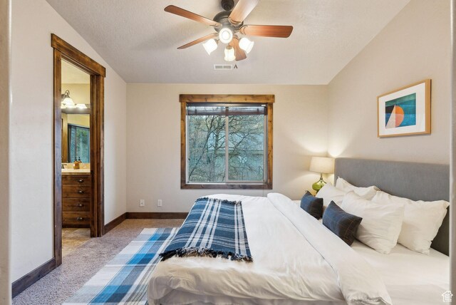 210 Parkview Dr, Summit Park, UT 84098 - carpeted bedroom featuring visible vents, baseboards, a textured ceiling, a ceiling fan, and ensuite bath