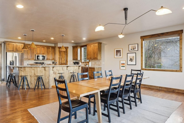210 Parkview Dr, Summit Park, UT 84098 - dining room featuring recessed lighting, baseboards, and light wood finished floors