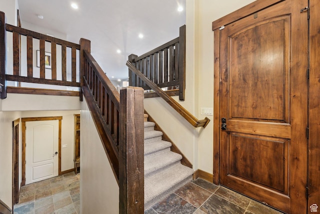 210 Parkview Dr, Summit Park, UT 84098 - stairs with baseboards, recessed lighting, and stone tile floors