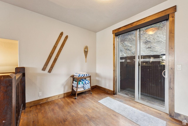 210 Parkview Dr, Summit Park, UT 84098 - living area with baseboards and wood finished floors