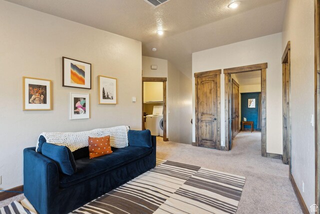 210 Parkview Dr, Summit Park, UT 84098 - living room featuring carpet floors, baseboards, washer / clothes dryer, and vaulted ceiling