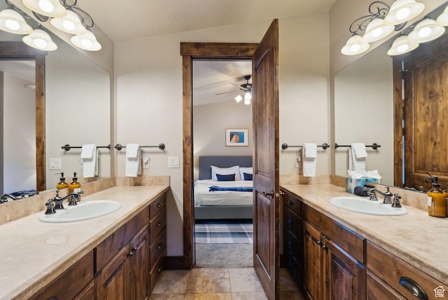 210 Parkview Dr, Summit Park, UT 84098 - full bathroom with a ceiling fan, vaulted ceiling, a sink, and ensuite bath
