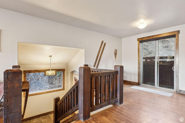 210 Parkview Dr, Summit Park, UT 84098 - staircase featuring baseboards and wood finished floors