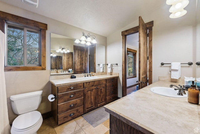 210 Parkview Dr, Summit Park, UT 84098 - bathroom with vanity, visible vents, lofted ceiling, toilet, and tile patterned floors