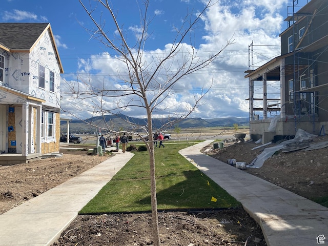 view of community featuring a mountain view and stairway