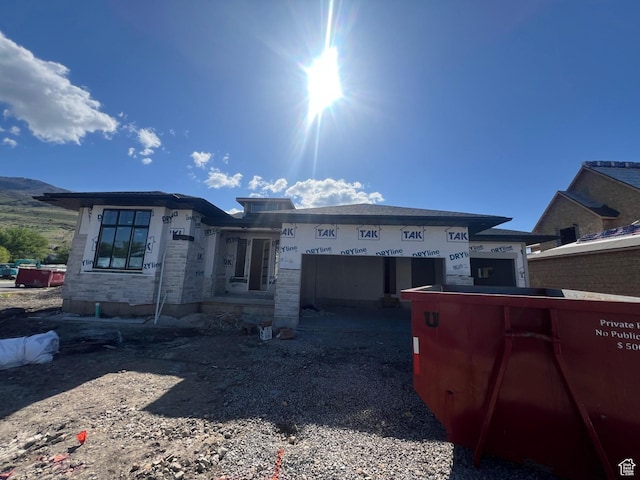 581 W Summerhill Ln N, Centerville, UT 84014 - rear view of property with a garage and gravel driveway