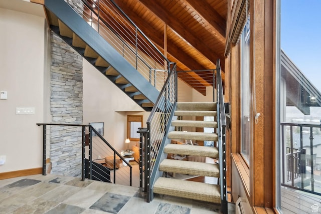 1386 Pinnacle Dr Unit 82, Park City, UT 84060 - staircase with a wooden ceiling with exposed beams and baseboards