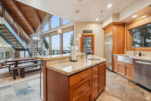 1386 Pinnacle Dr Unit 82, Park City, UT 84060 - kitchen with dishwasher, built in refrigerator, a chandelier, wood ceiling, and light stone counters