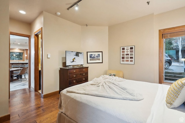 1386 Pinnacle Dr Unit 82, Park City, UT 84060 - bedroom with wood finished floors, rail lighting, access to exterior, and recessed lighting