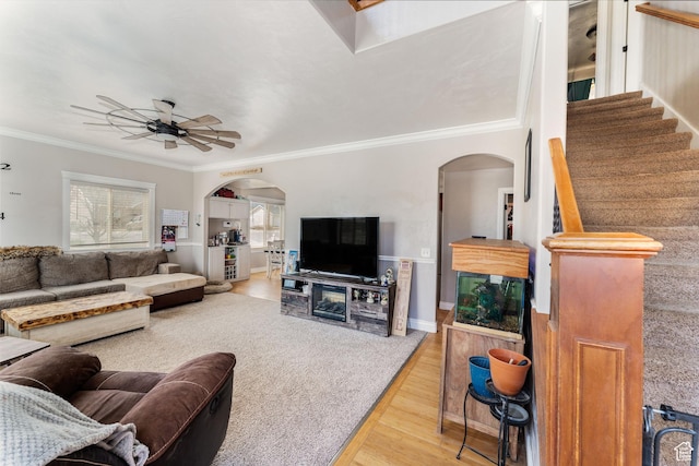 4231 W 650 N, Vernal, UT 84078 - living room with crown molding, arched walkways, ceiling fan, and wood finished floors