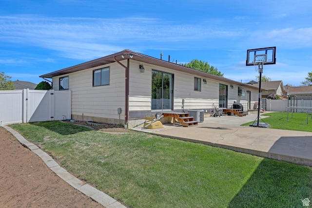 2137 W 550 N, West Point, UT 84015 - back of house featuring a yard, a patio, a gate, and a fenced backyard