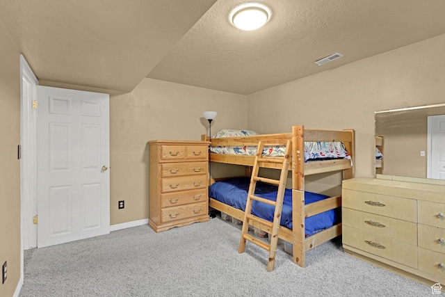 2137 W 550 N, West Point, UT 84015 - bedroom featuring carpet floors, a textured ceiling, visible vents, and baseboards