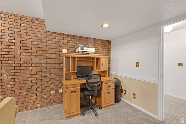 2137 W 550 N, West Point, UT 84015 - office featuring baseboards, a textured ceiling, brick wall, and light carpet