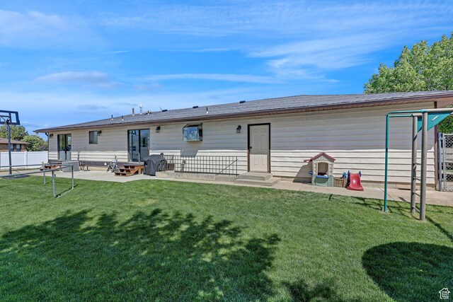 2137 W 550 N, West Point, UT 84015 - rear view of property with a patio area, fence, a yard, and entry steps