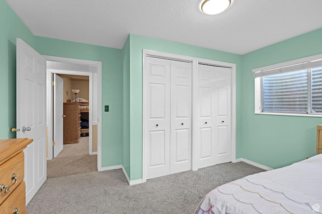 2137 W 550 N, West Point, UT 84015 - bedroom with carpet flooring, baseboards, and multiple closets