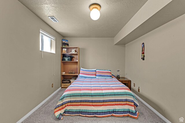 2137 W 550 N, West Point, UT 84015 - bedroom with baseboards, carpet, a textured ceiling, and visible vents