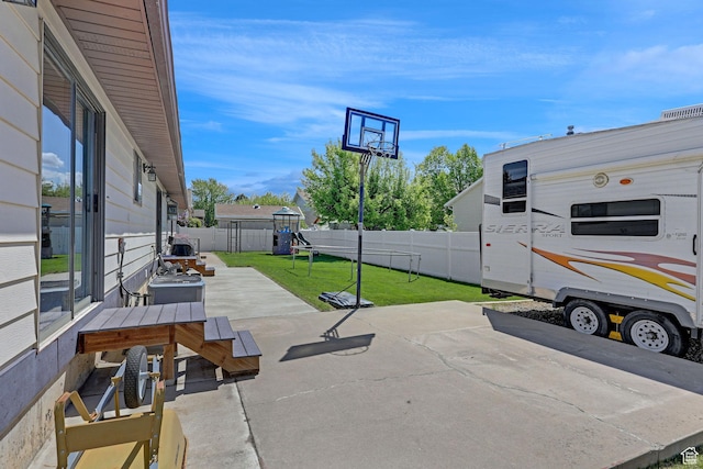 2137 W 550 N, West Point, UT 84015 - view of patio featuring a fenced backyard and a playground